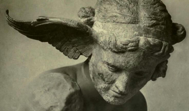 An image of a sculpture of the Greek god of sleep, Hypnos. A feathered wing sprouts from the side of his brow as his gaze is cast downwards.